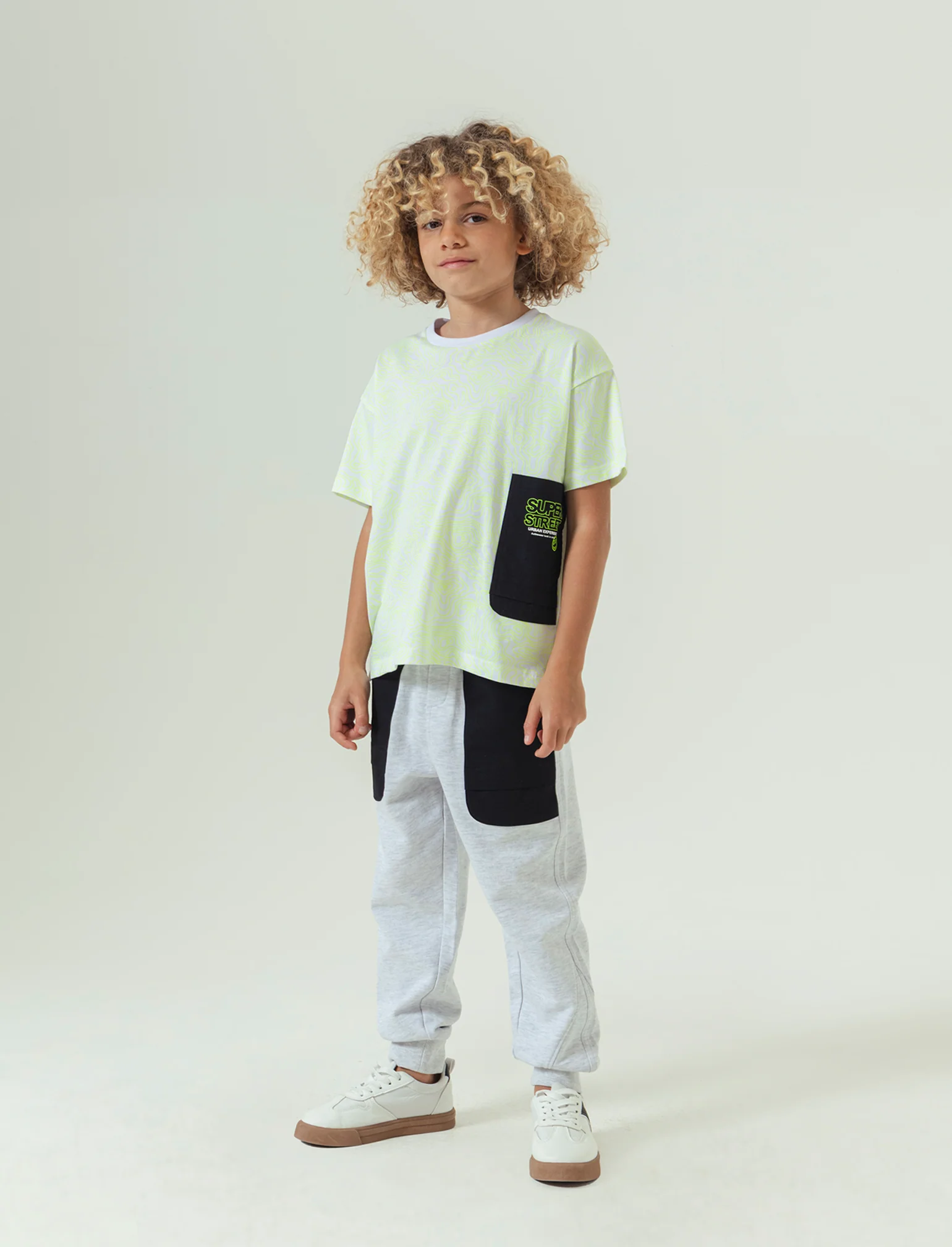 Jogger con tasconi da bambino - Grigio mel.