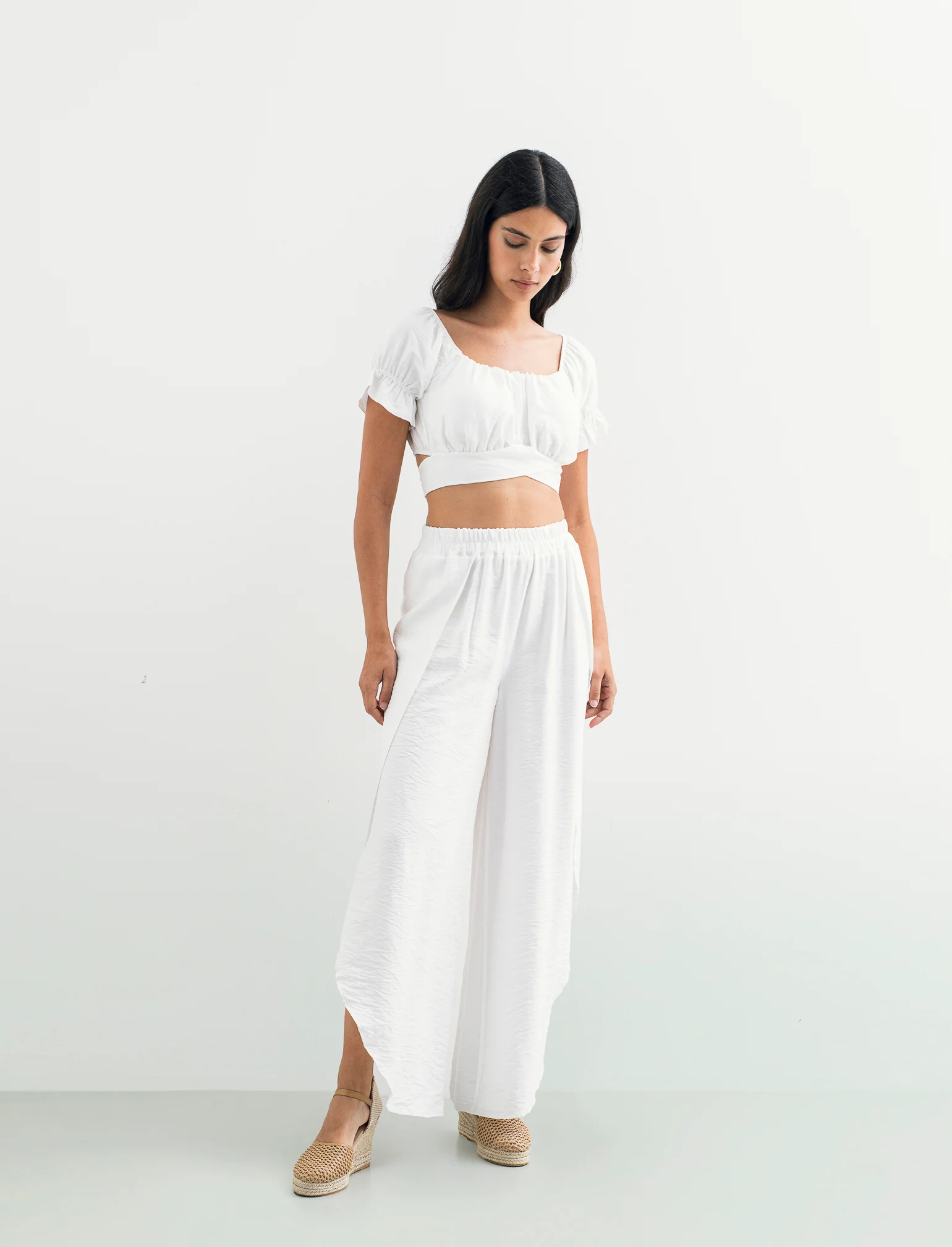 Pantalone a palazzo con elastico in vita - Bianco