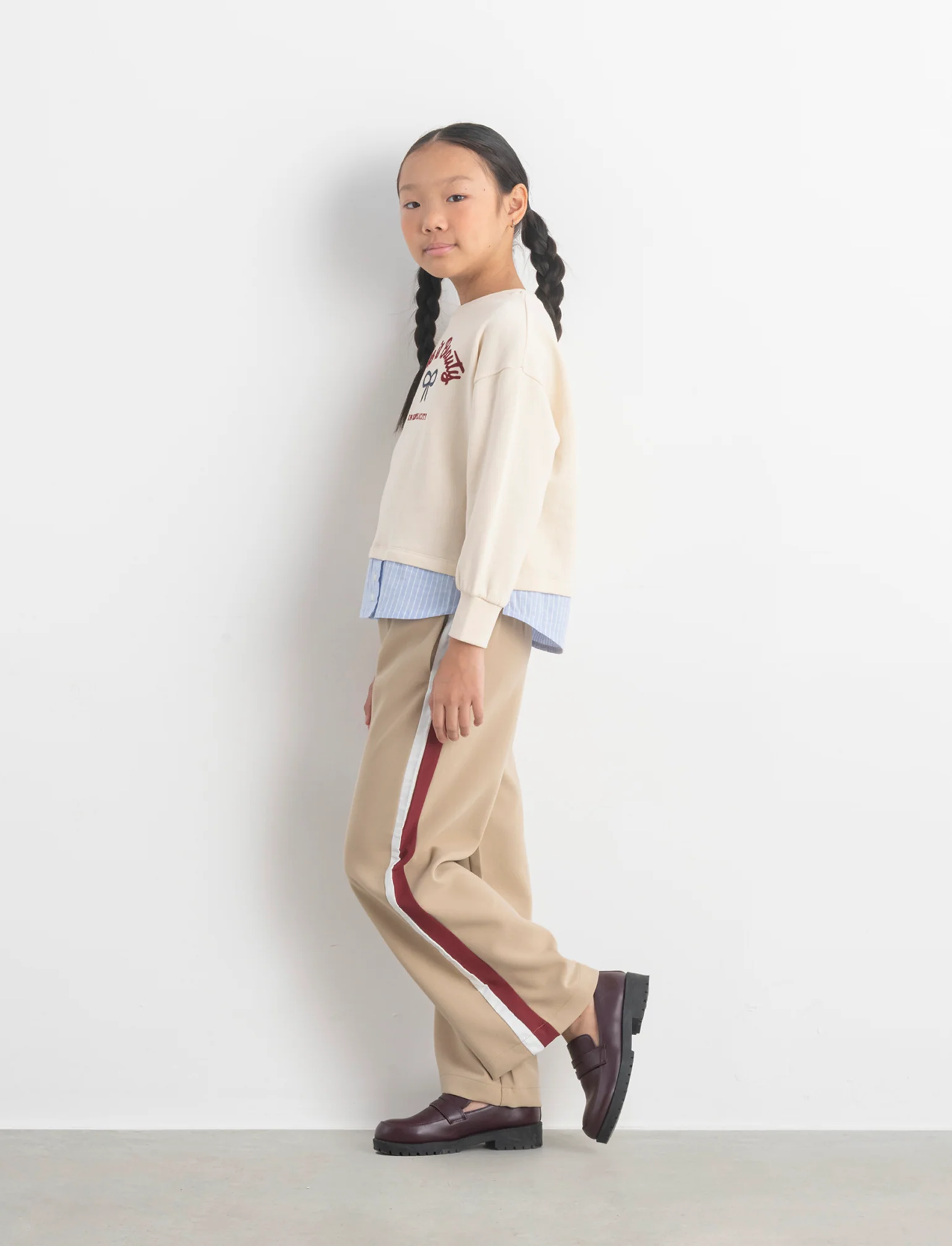Pantaloni da bambina con bandine laterali a contrasto. - Beige