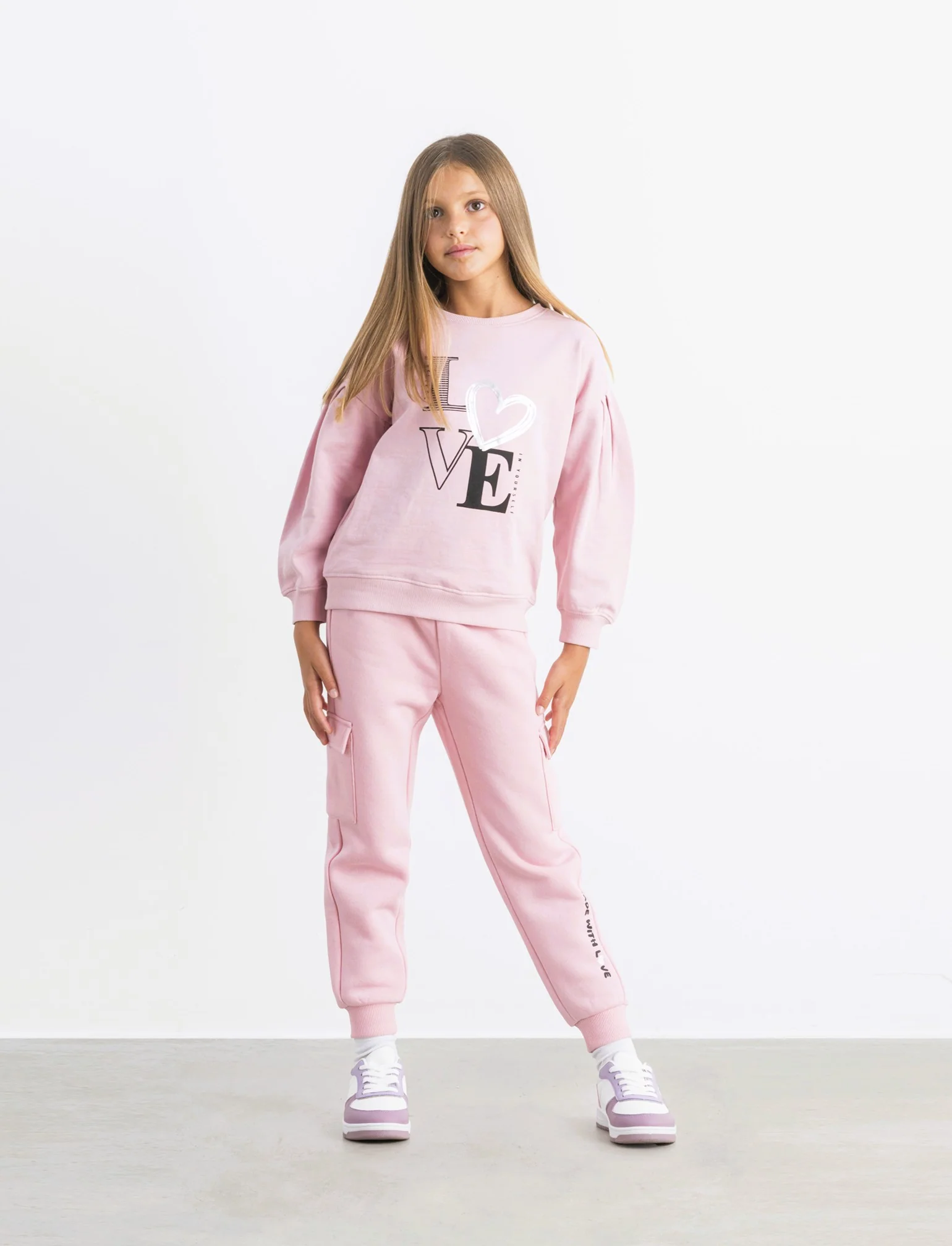 Pantaloni in felpa con tasconi. - Rosa