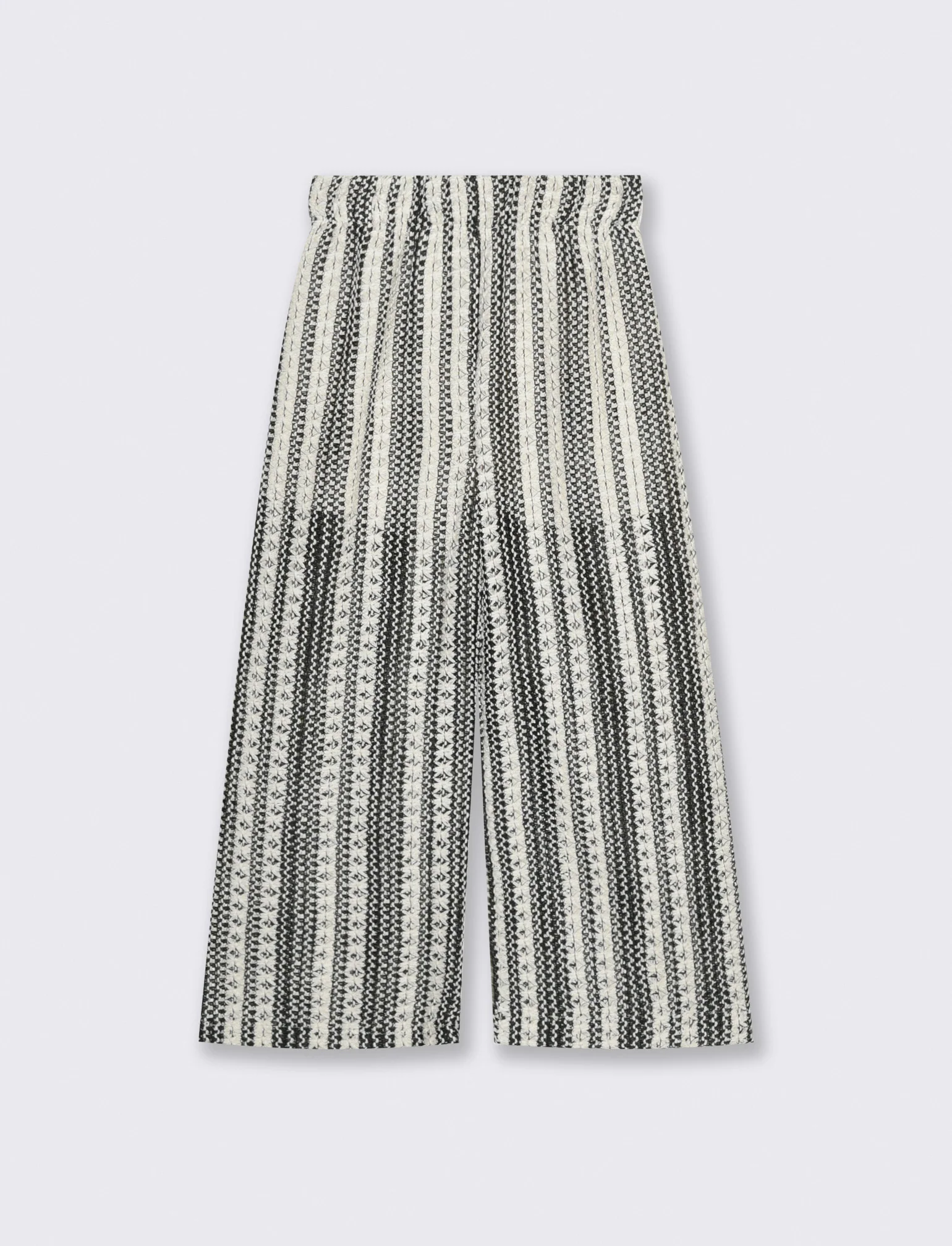 Pantaloni in tessuto a rete traforato. - Fantasia