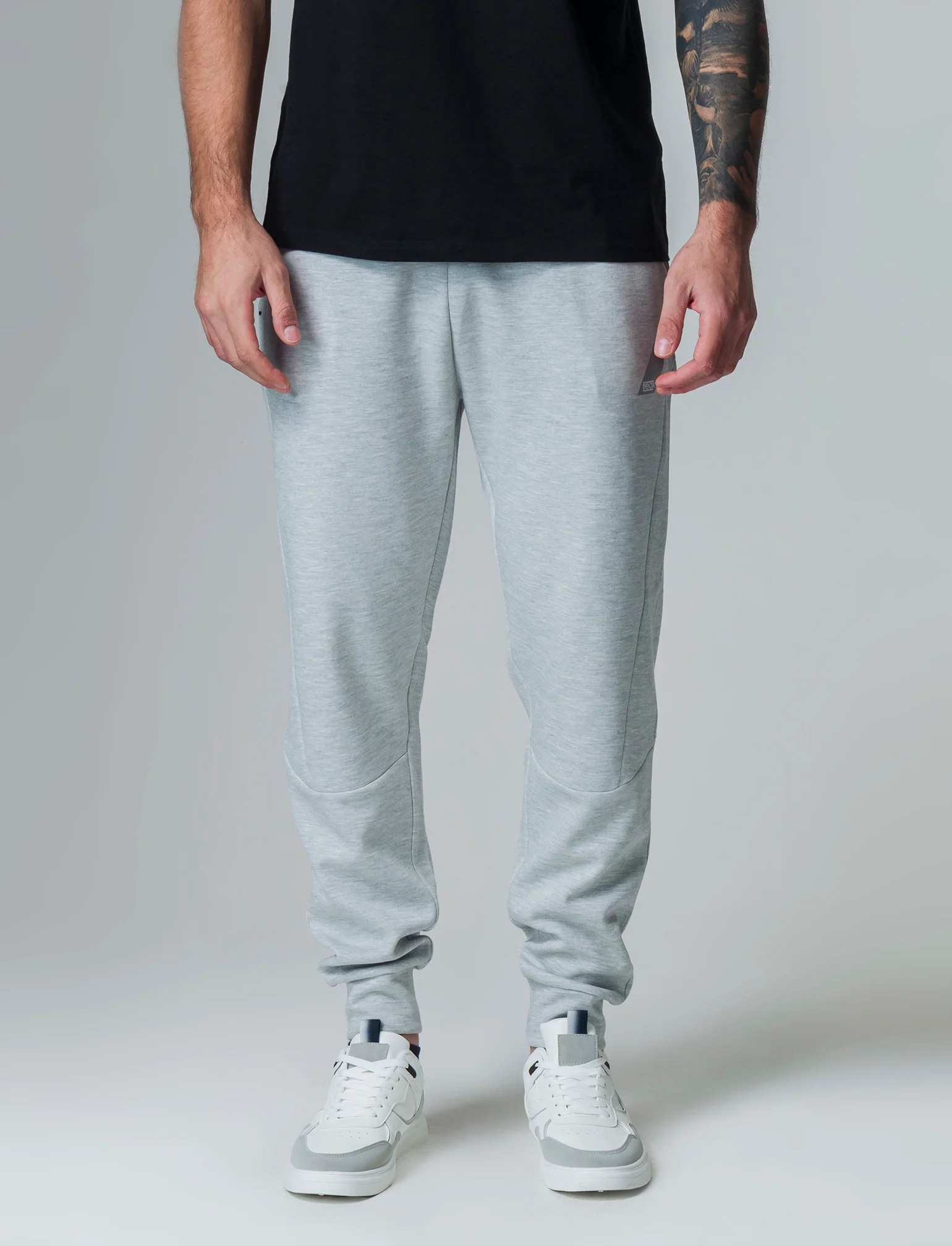 Pantaloni sportivi in interlock: da uomo - Grigio mel.