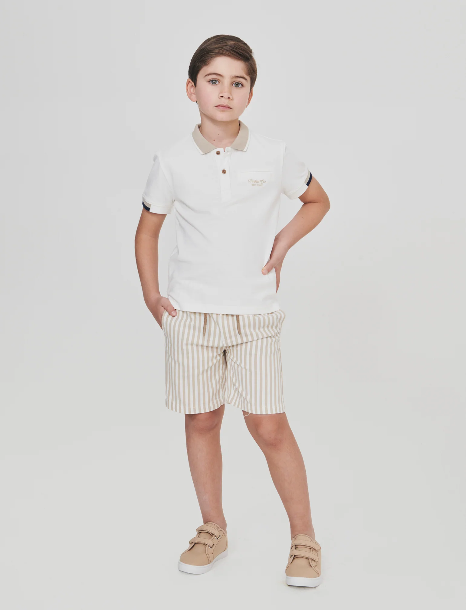 Polo in piquet con taschino elegante - Bianco latte