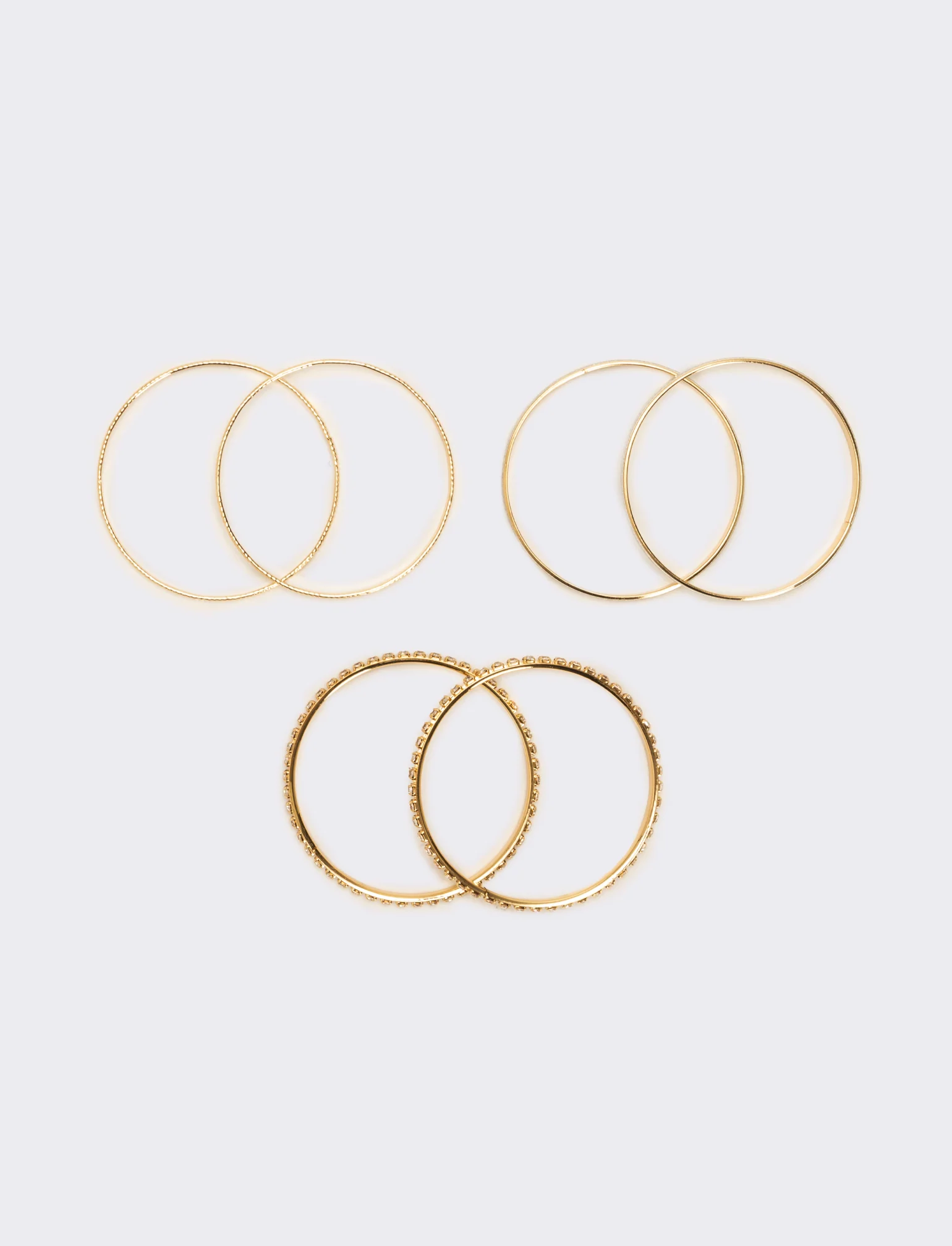 Sei bracciali rigidi con strass - Oro