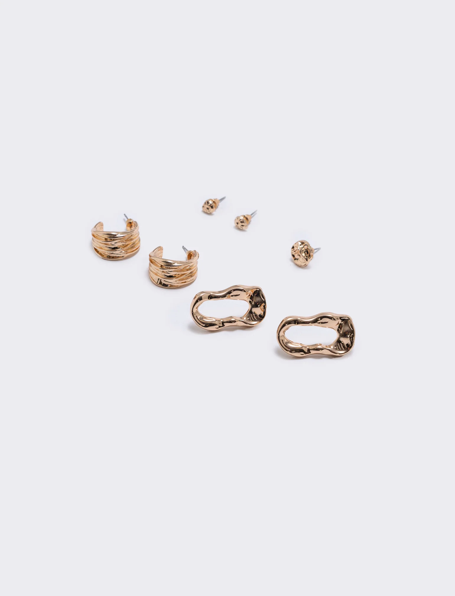 Set di orecchini in varie forme e dimensioni - Oro